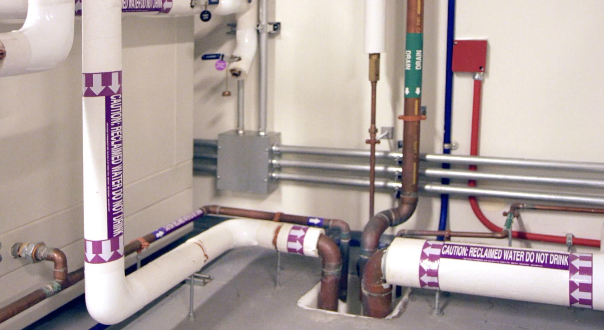 An underwater view of sunshine glimmering at the surface of the ocean. 