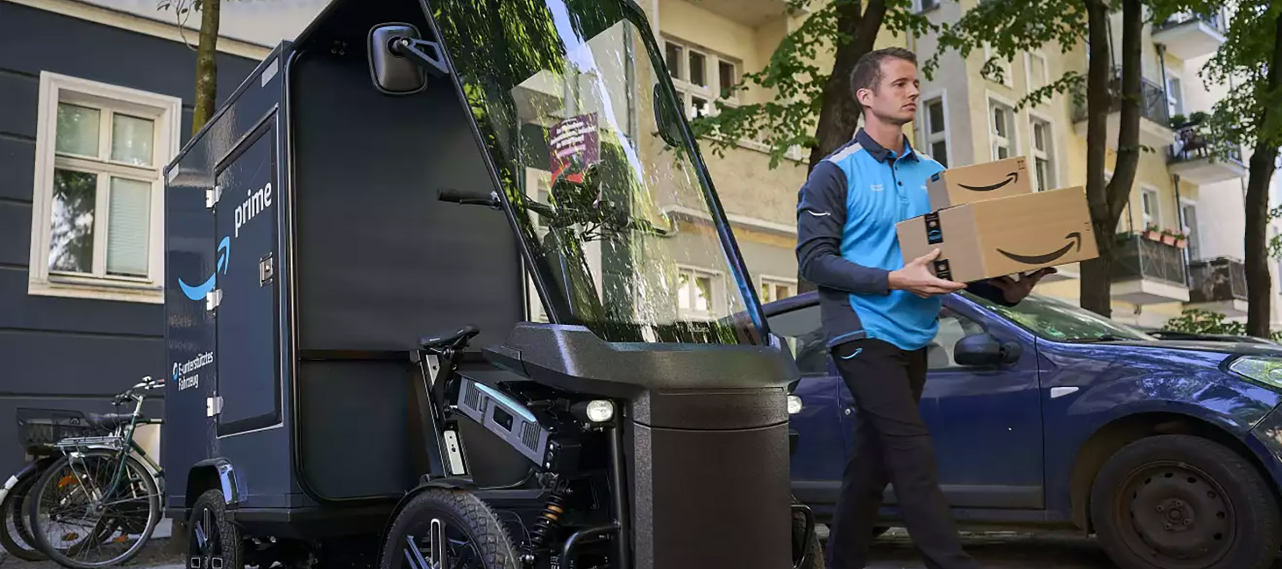 A delivery driver carries packages out of a van. 